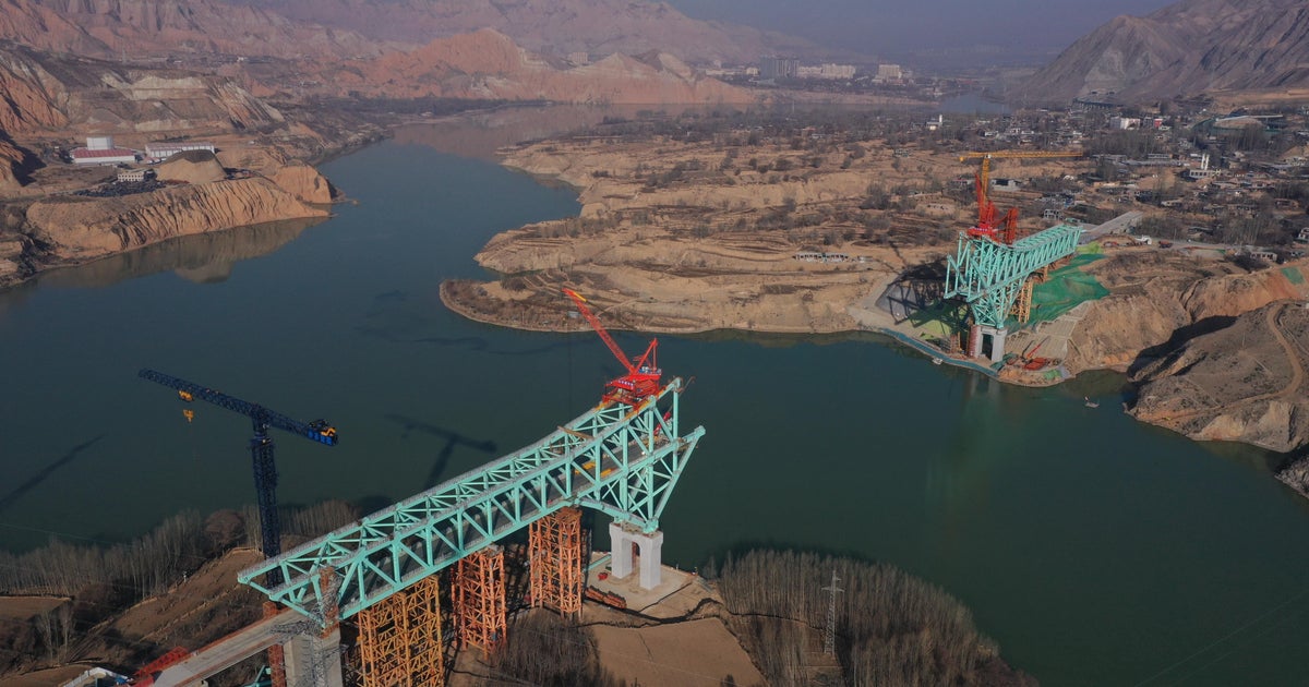 Bridge under construction in China collapses into Yellow River, killing at least 6 people, state media say