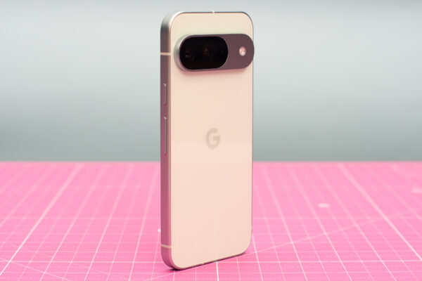 Google Pixel 9 in green Wintergreen color showing AI features on screen