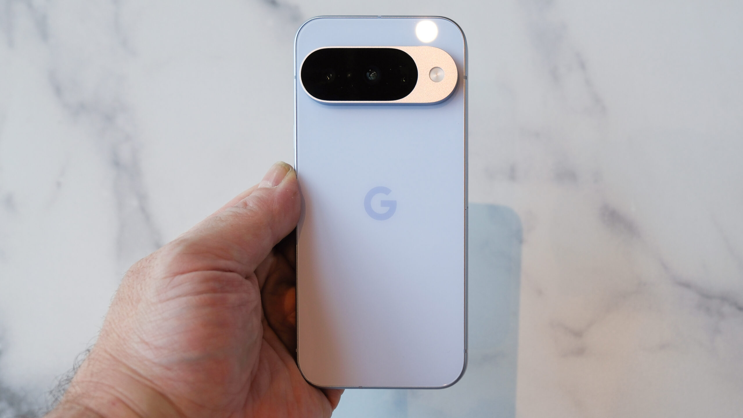 Google Pixel 10 showing back and camera bump in frost