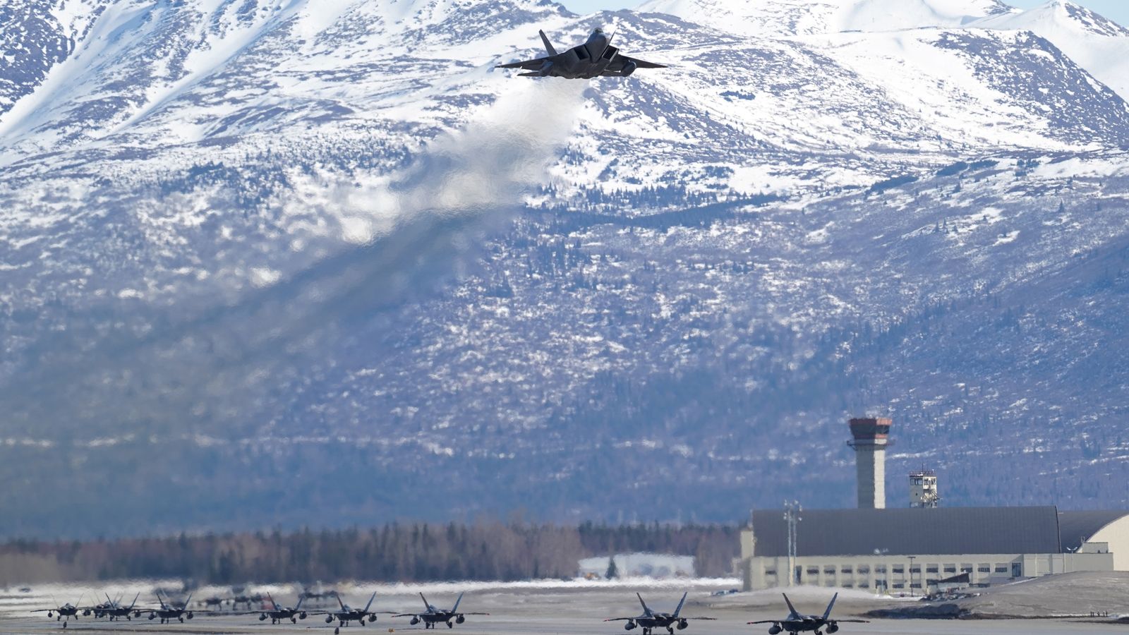 The base is home to F-22 Raptor fighter jets. All pics: Reuters