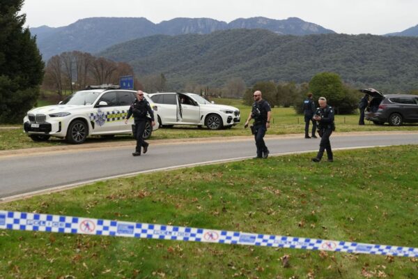 Police officers on the scene after a shooting incident in Porepunkah, Victoria. Pic: Simon Dallinger/EPA/Shutterstock