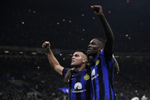 TOPSHOT - Inter Milan forward Marcus Thuram (R) celebrates with teammate Inter Milan forward Lautaro Martinez after scoring the team