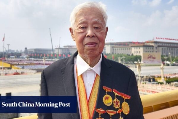 Who is the 94-year-old Hong Kong war veteran who shook hands with President Xi?