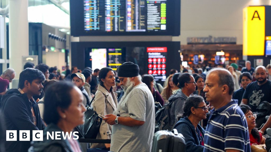 Delays after airport check-in system hit