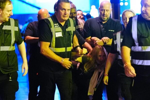 Climate protesters removed from Reform conference after heckling Nigel Farage