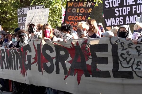 Three arrested after protest outside defence event