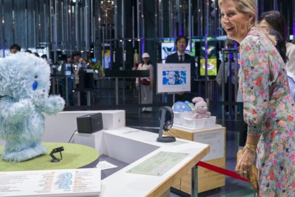 Duchess of Edinburgh interacts with robot dog during Japan visit