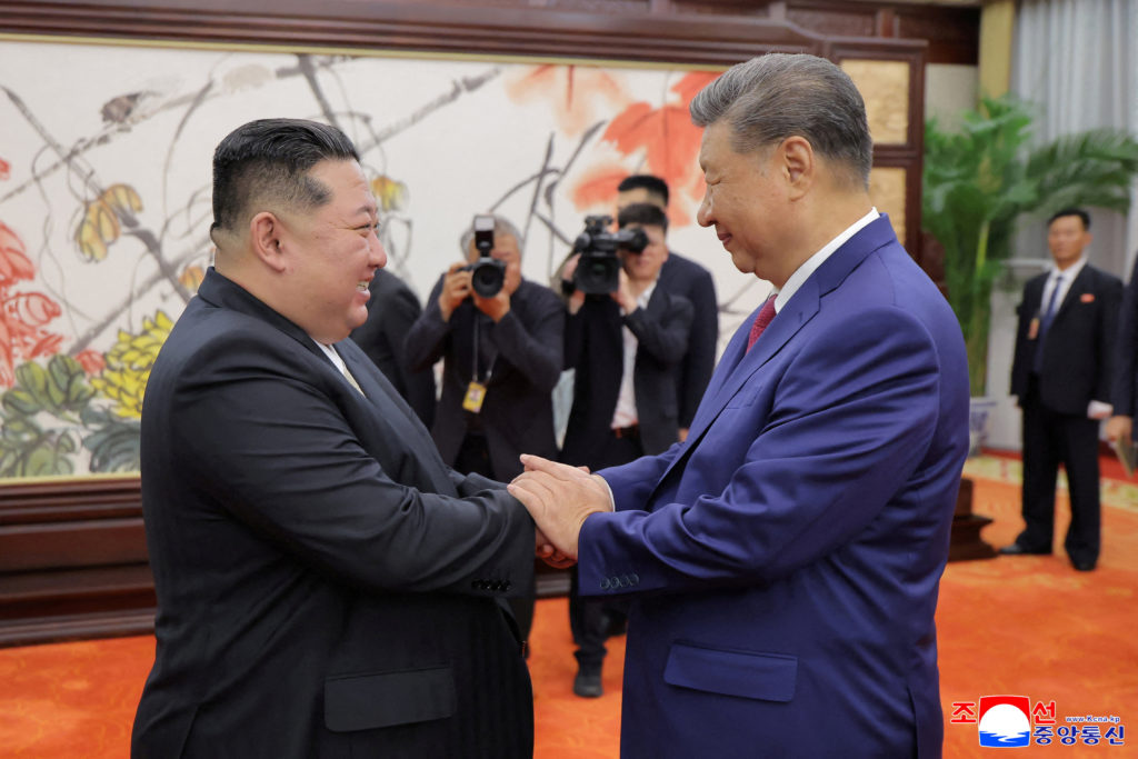 North Korean leader Kim Jong Un and Chinese President Xi Jinping meet in Beijing