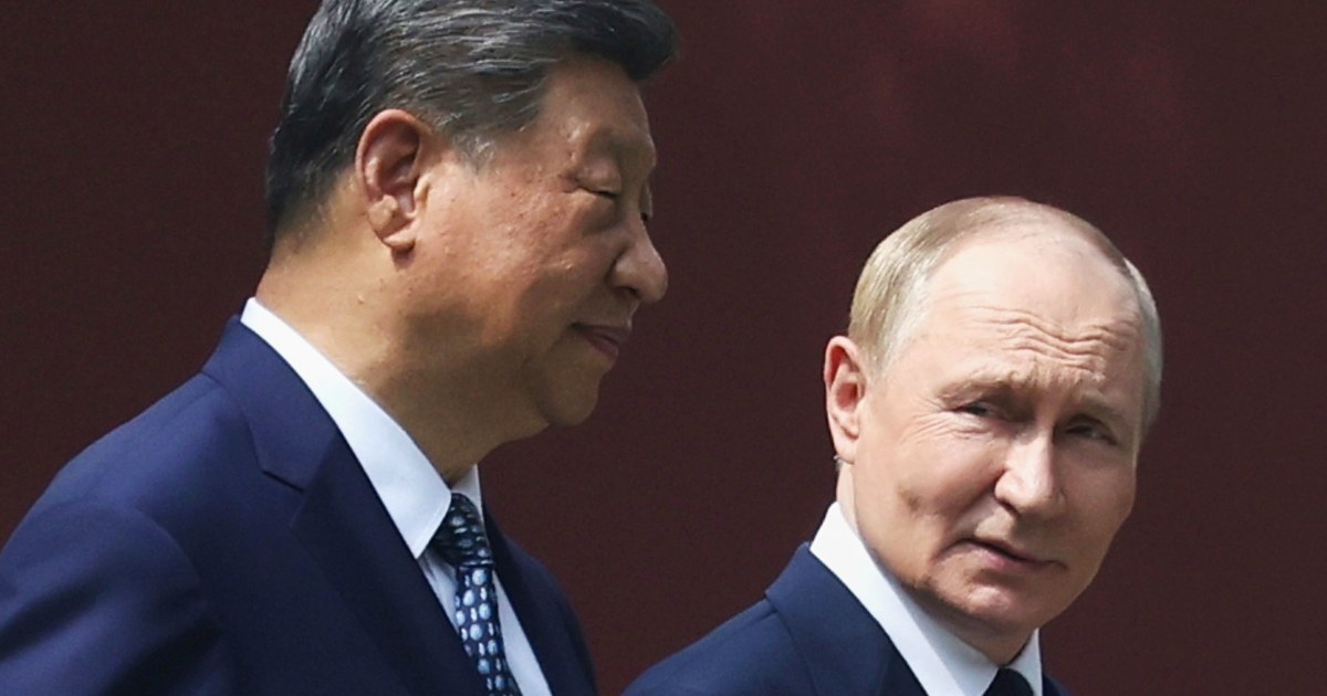 Putin hails friendship with China as Kim Jong Un joins show of force