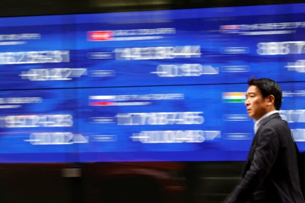 Stocks gain on rate cut optimism, yen dives after Ishiba resigns