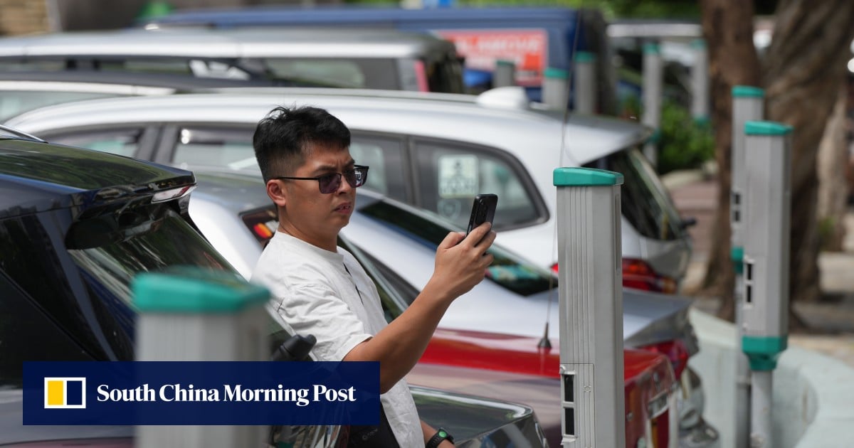 Taxi drivers grumble as Hong Kong doubles parking meter charge