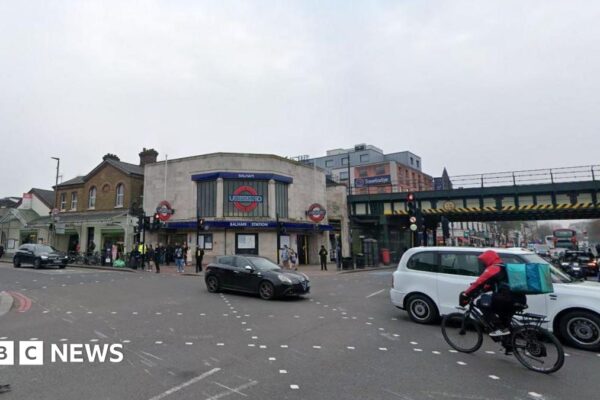 A general view of Balham High Road, showing Balham Underground station and a busy crossroads.