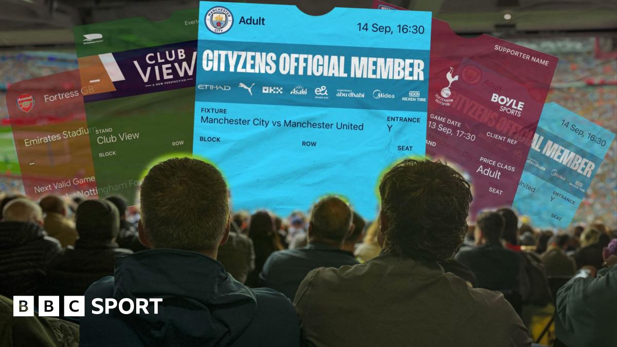 A group of fans are sitting in the stands at a football watch, in front of them are a number of large scale tickets for Manchester City, Everton, West Ham, and Arsenal