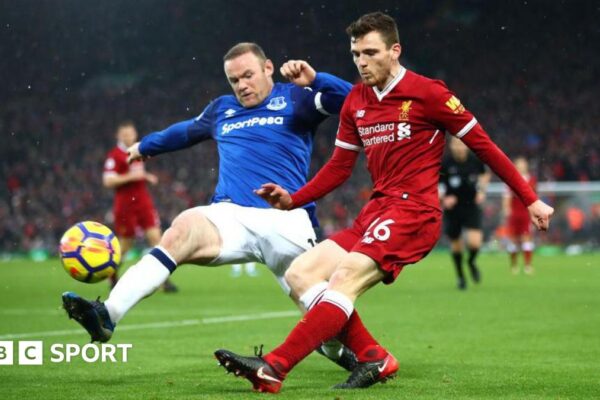 Wayne Rooney in action for Everton against Liverpool's Andy Robertson
