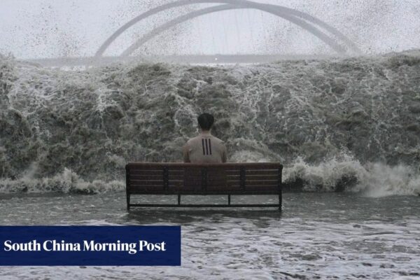 Post photographer hopes viral Ragasa man-on-bench image warns against danger
