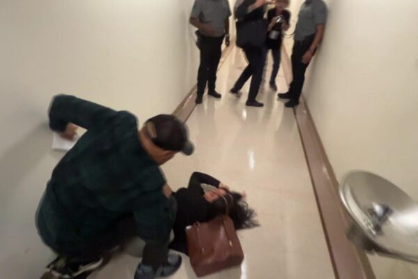 ICE officer seen on video pushing woman to ground has returned to duty