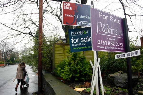 UK house prices fall while rents rise by least in 4 years, surveys show