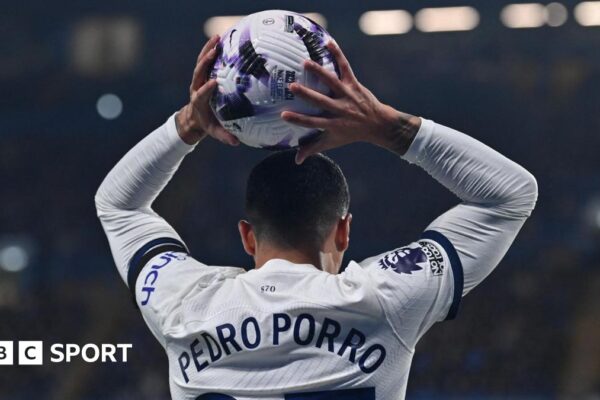 Pedro Porro takes a throw in