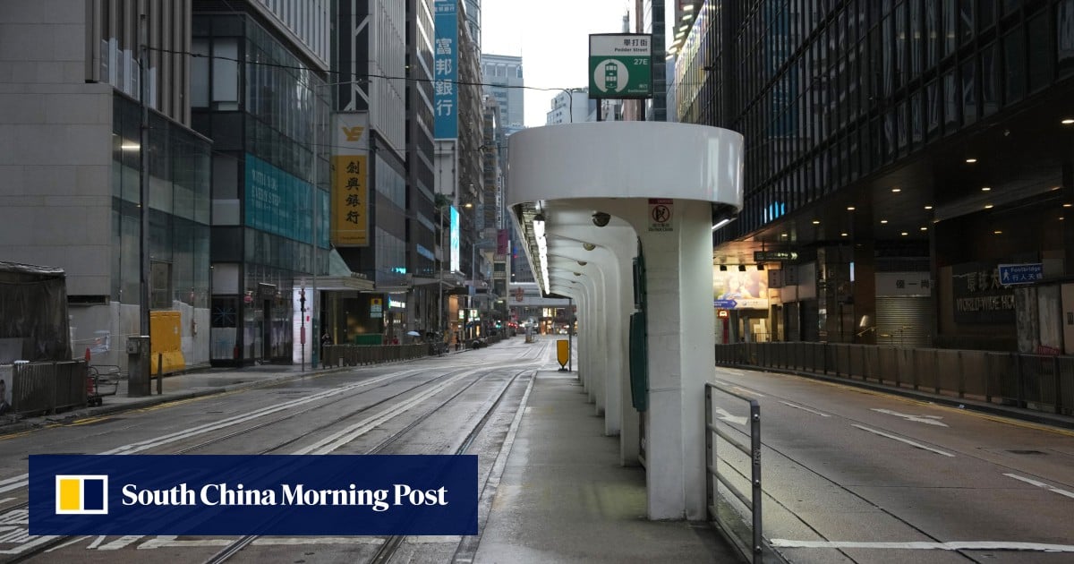 Hong Kong bankers pack luxury hotels near offices for typhoon trading