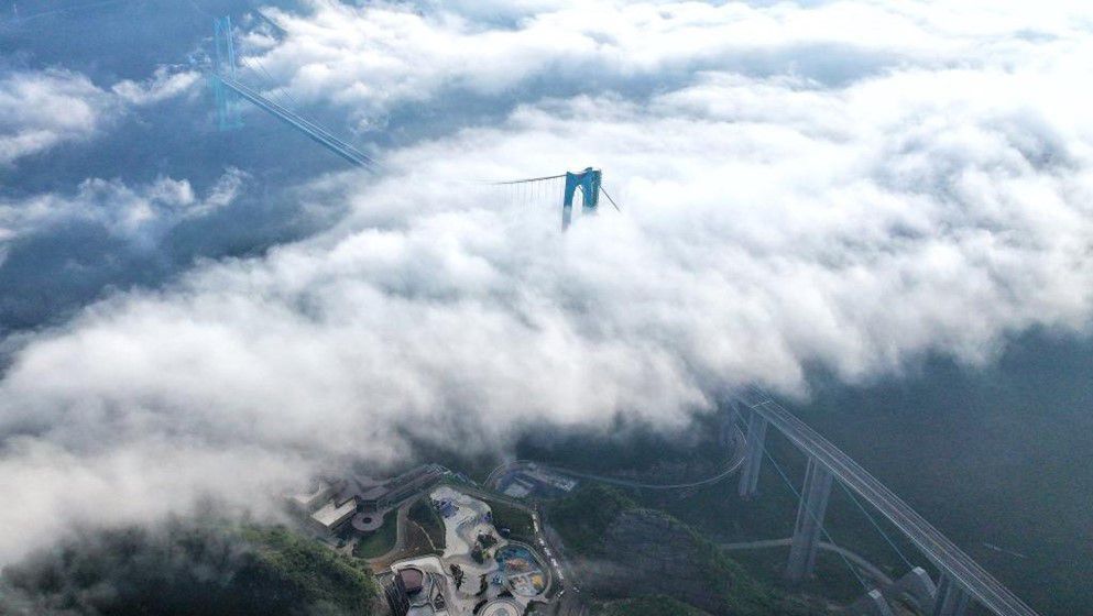 China Opens World’s Tallest Bridge to Traffic...