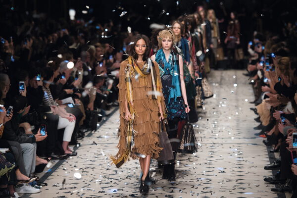 Models on the runway at London Fashion Week