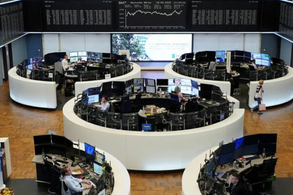 Stocks rise, dollar falls as investors assess mixed Fed messages