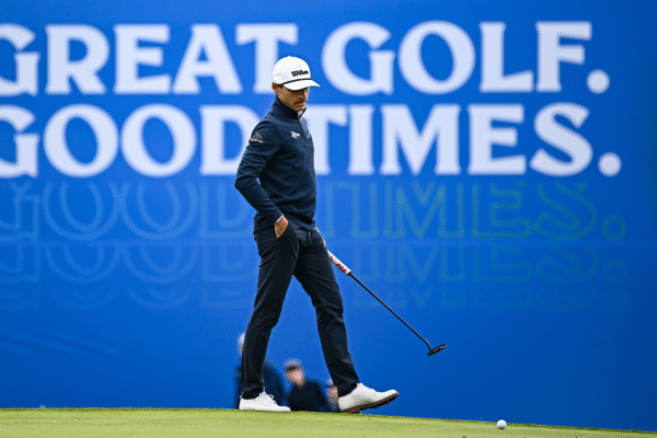 Joakim Lagergren walks up to the green to putt