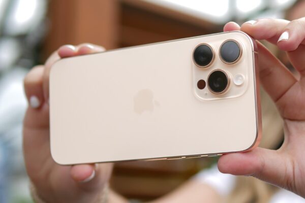 iPhone 16 Pro Max shown in hand
