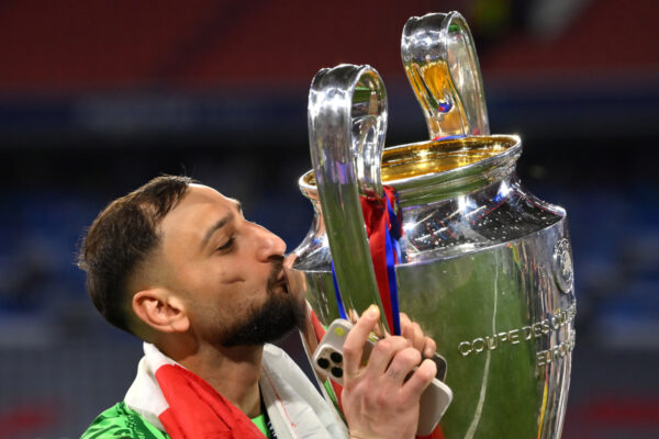 MUNICH, GERMANY - MAY 31: Gianluigi Donnarumma of Paris Saint-Germain kisses the UEFA Champions League trophy after his team