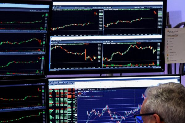 Wall Street indexes hit records; Tesla and Micron rally