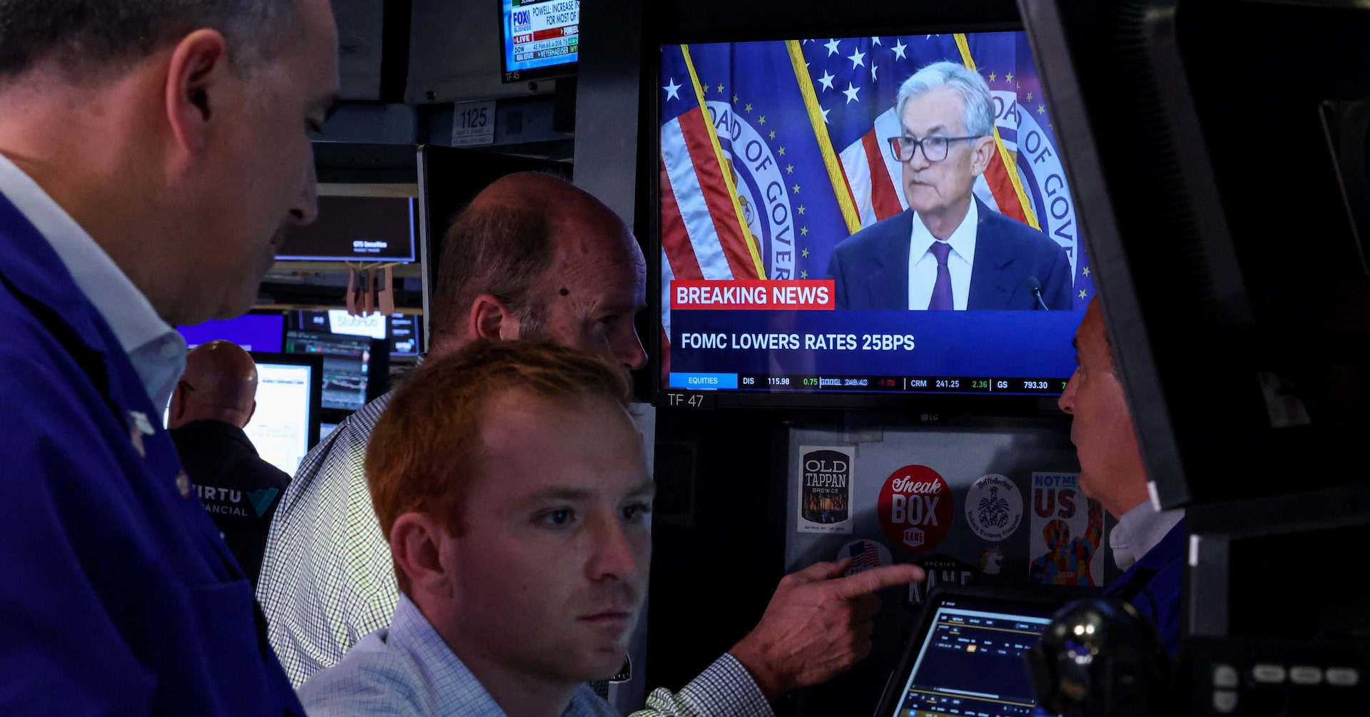 Fed's rate cut comes with caveats, leaving investors lukewarm