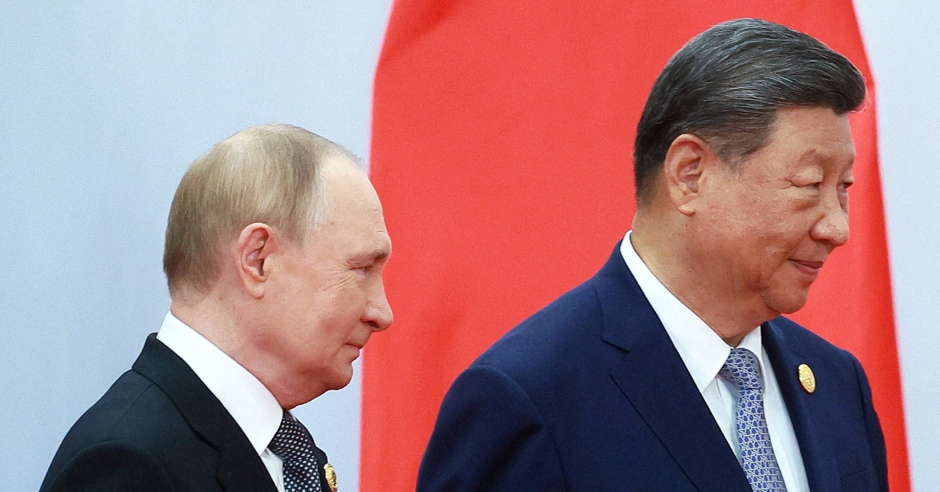 China's Xi pushes a new global order, flanked by leaders of Russia and India