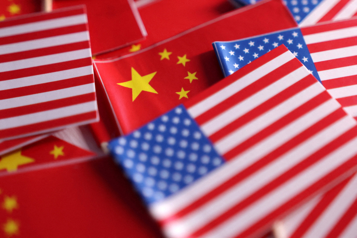 FILE PHOTO: U.S. and Chinese flags are seen in this illustration created on March 20, 2025. REUTERS/Dado Ruvic/Illustration/File Photo