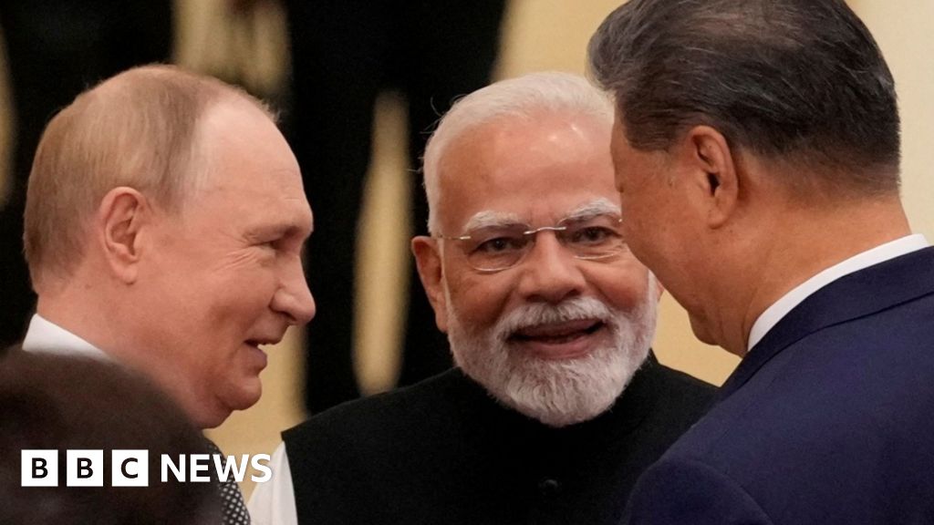 BBC analyses the warmth and hand-holding at Xi, Modi and Putin's summit