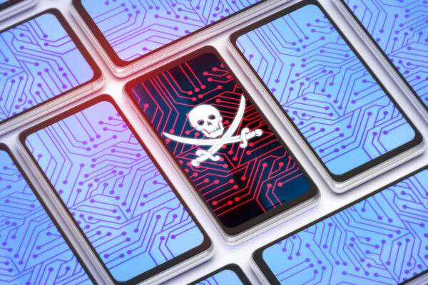 One phone with skull and crossbones on screen among several other clean-looking phones.