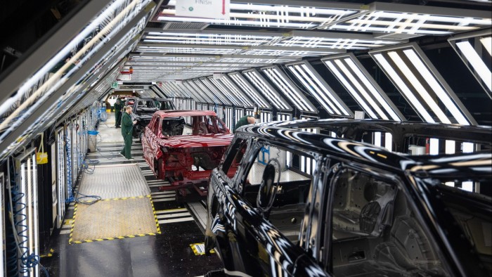 Range Rover SUV bodies being painted and inspected at the Jaguar Land Rover plant.