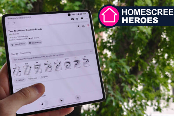 Ultimate Guitar open on a folding phone. Tree in the background