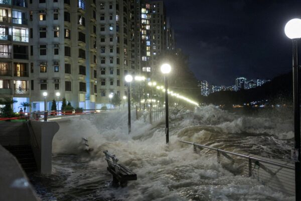 Waves from Super Typhoon Ragasa crash on to the shore in Hong Kong. Pic: Reuters