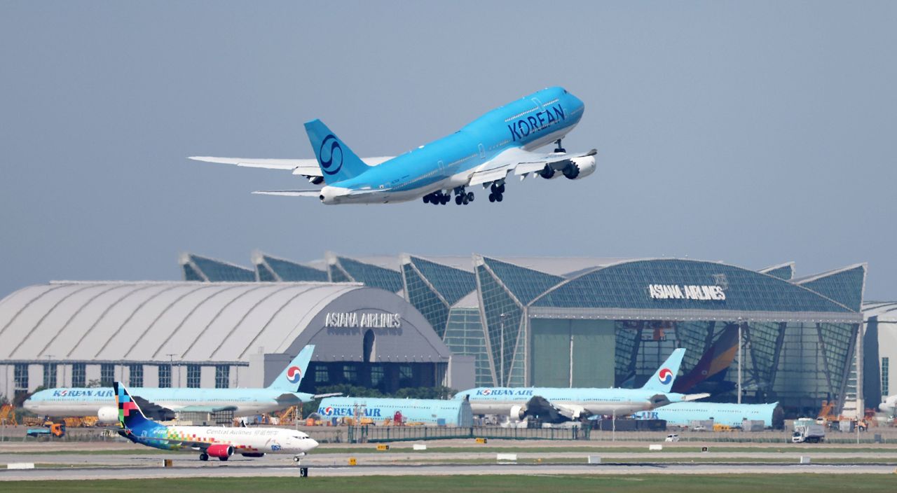 A Korean Air chartered plane takes off to bring back Korean workers detained in an immigration raid in Georgia, at Incheon International Airport, South Korea, Wednesday, Sept. 10, 2025. (Yonhap via AP)