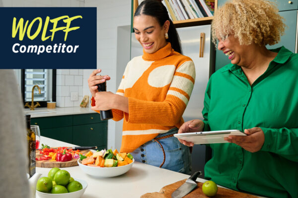 Friends preparing a healthy meal in the kitchen.