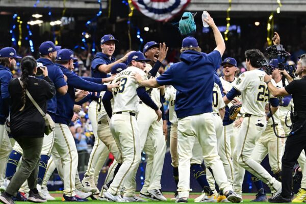 Oct 11, 2025; Milwaukee, Wisconsin, USA; Milwaukee Brewers pitcher Abner Uribe (45) celebrates with teammates after defeating the Chicago Cubs during game five of the NLDS round for the 2025 MLB playoffs at American Family Field. Mandatory Credit: Benny Sieu-Imagn Images