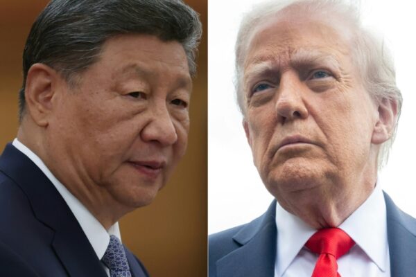 US President Donald Trump (R) relit his trade war with China by threatening fresh tariffs and suggested a planned meeting with Chinese counterpart Xi Jinping might not go ahead