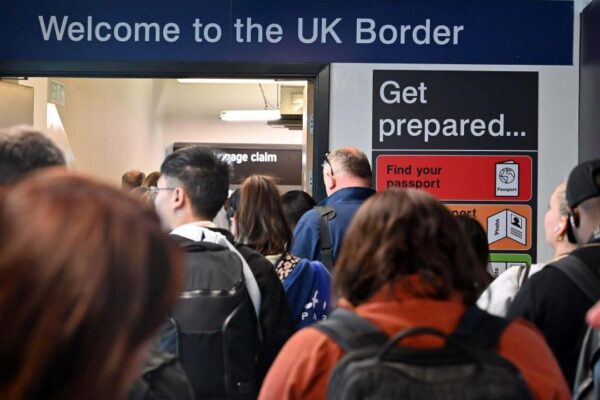 How many foreign nationals receive benefits in the UK?