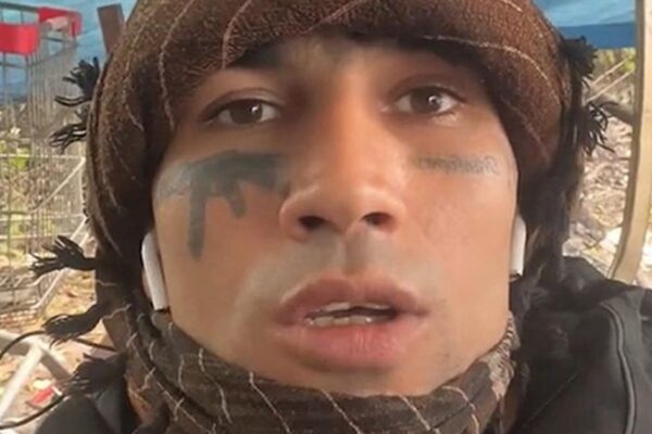 Migrant who threatened to kill Nigel Farage gave police false name, court told