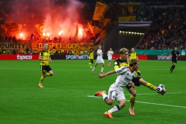 Football: Soccer-Dortmund advance in German Cup after shootout win at Frankfurt
