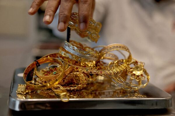 Gold rallies to record high on US government shutdown, Fed rate cut bets