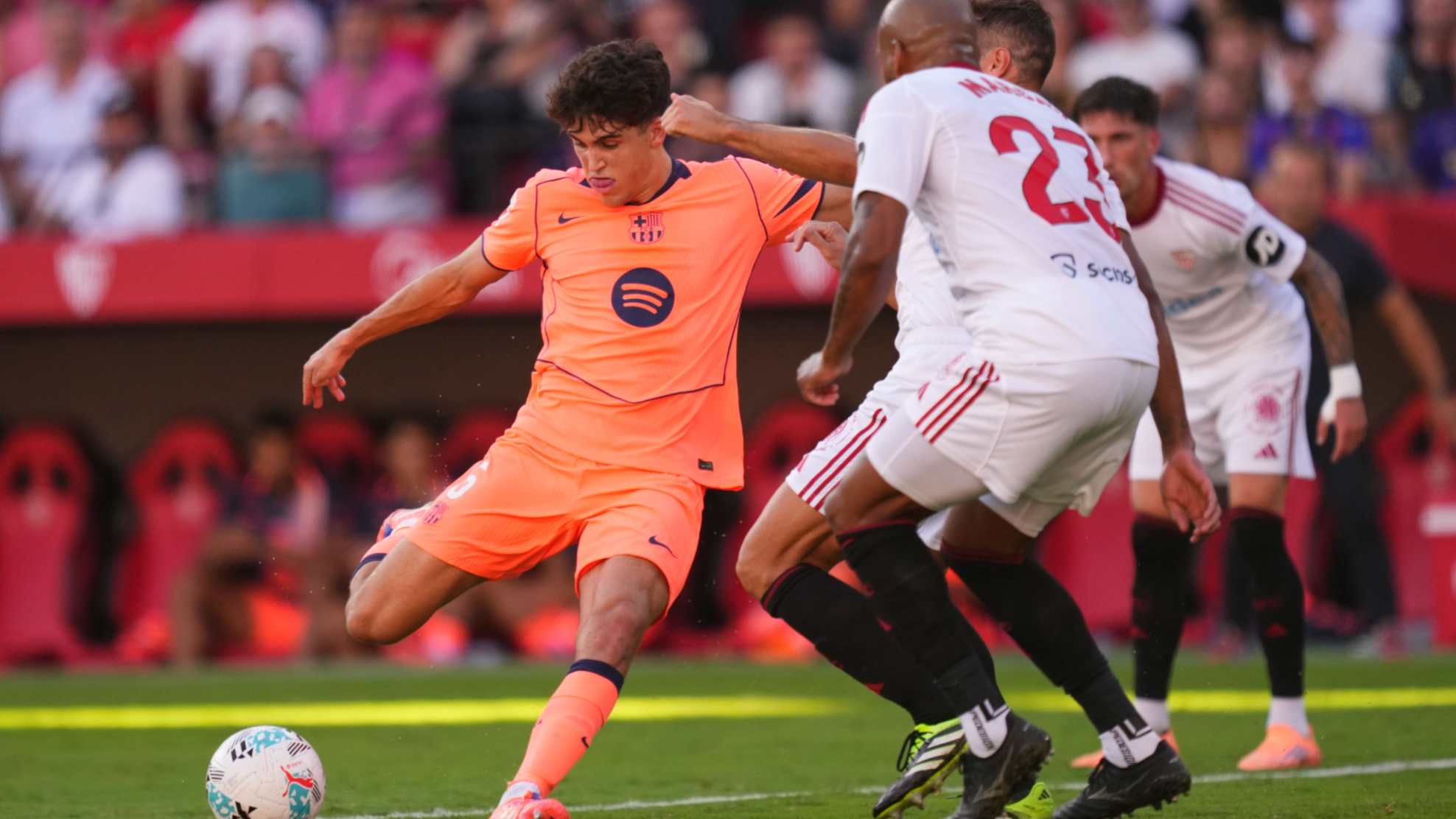 Barcelona beaten by Sevilla to leave Real Madrid top of La Liga