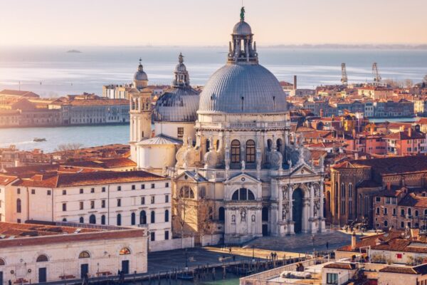 Aerial View of the Grand Canal and Basilica Santa Maria della Salute, Venice, Italy. Venice is a popular tourist destination of Europe. Venice, Italy.