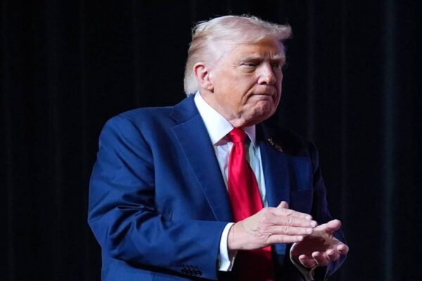 President Donald Trump walking off stage after speaking to a gathering of top U.S. military commanders at Marine Corps Base Quantico, Tuesday, Sept. 30, 2025, in Quantico, Va. (Photo source: AP)