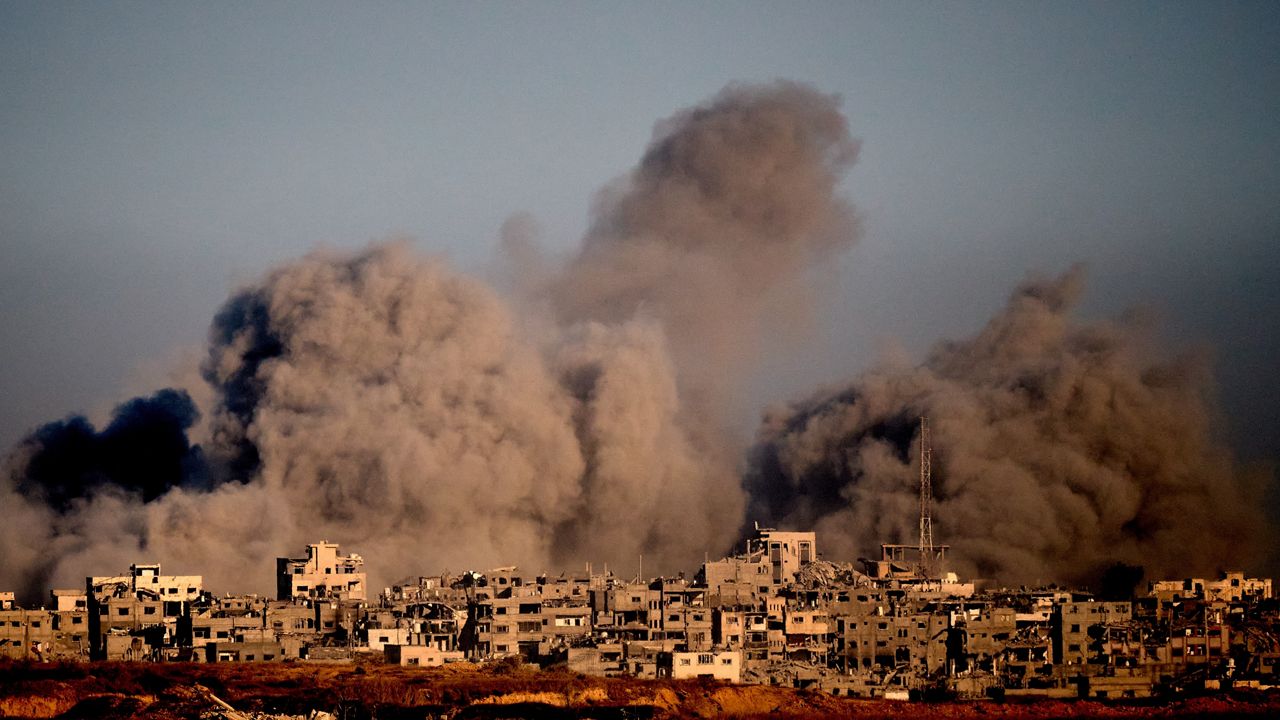 Smoke rises to the sky following an Israeli military strike in the northern Gaza Strip, as seen from southern Israel, Wednesday, Oct. 8, 2025. (AP Photo/Emilio Morenatti)
